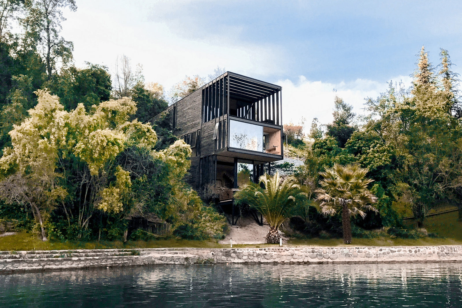 Timber-clad Slope House Peeks Out From The Forest Near A Chilean Lake