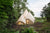 Teepee-shaped House A Community Kitchen And A Spiral-shaped Pool