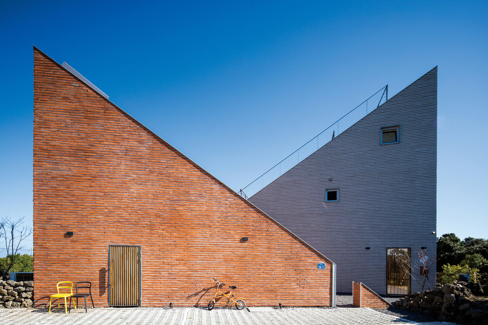 A House Is Divided Into Three Volumes For Additional Guest House In South Korea