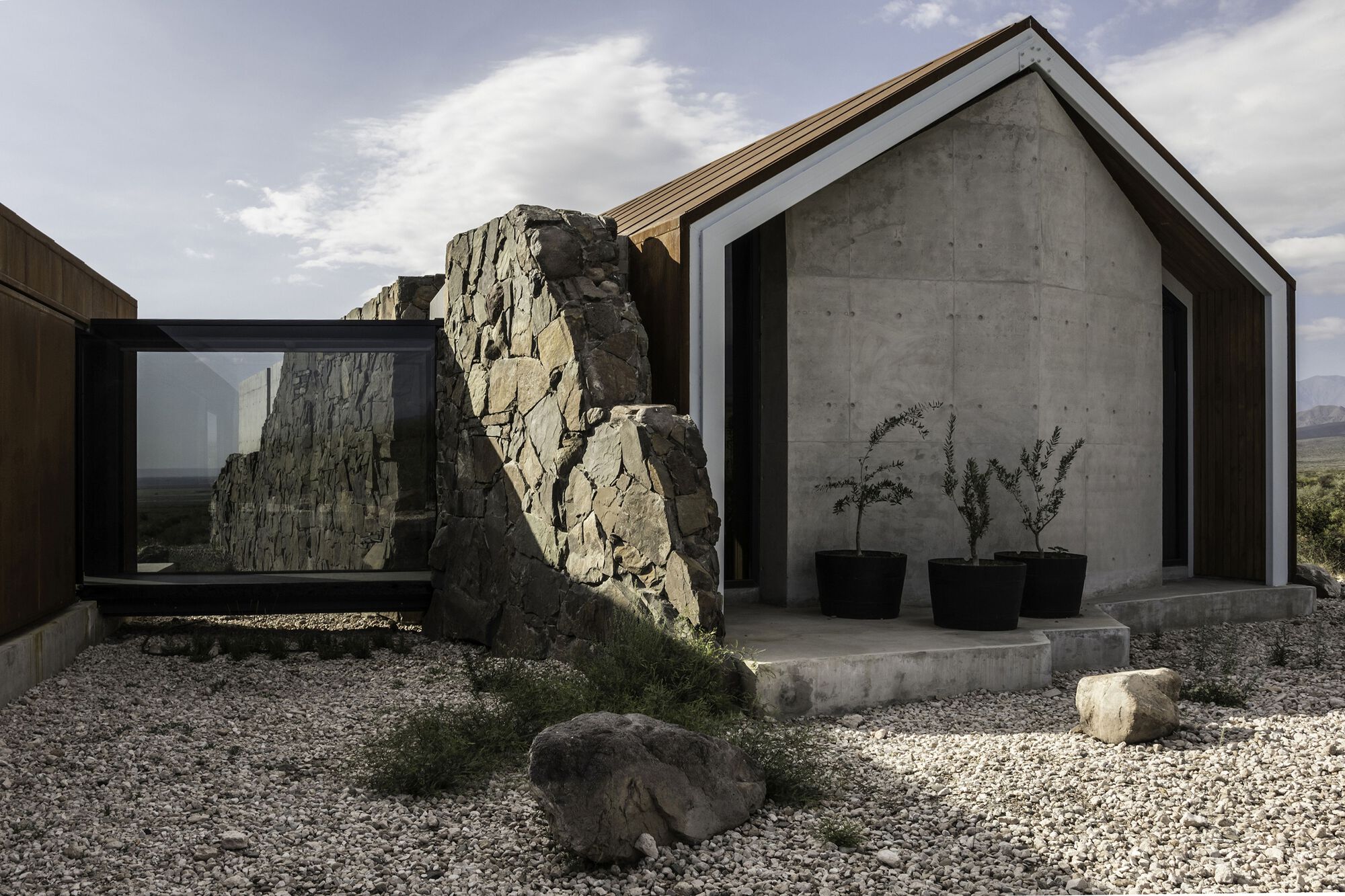 A Modern Stonehouses In Argentina Connected Each Other By Glass Bridge