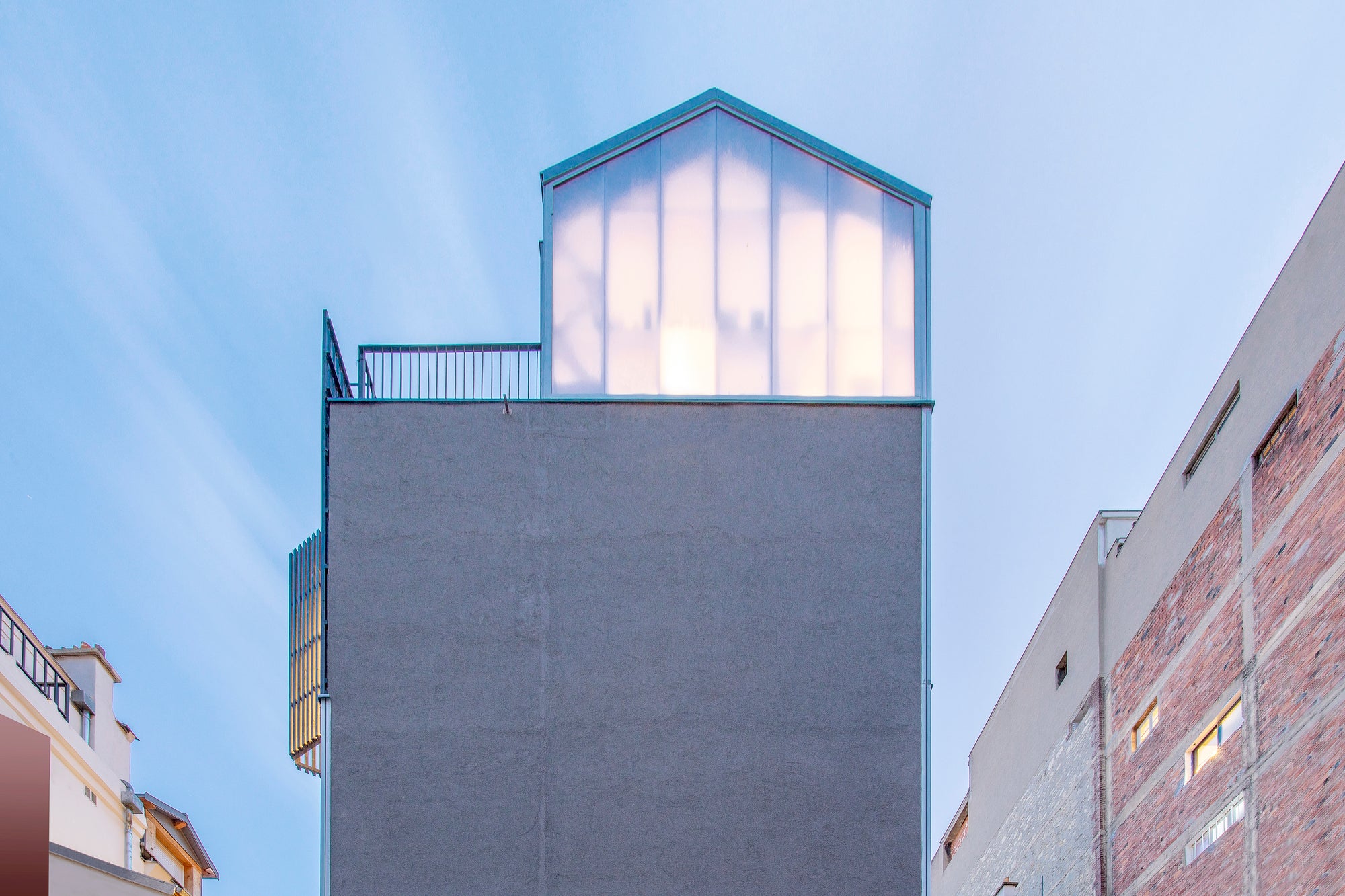 Modern Parisian Home Extends With Polycarbonate Clad Tower