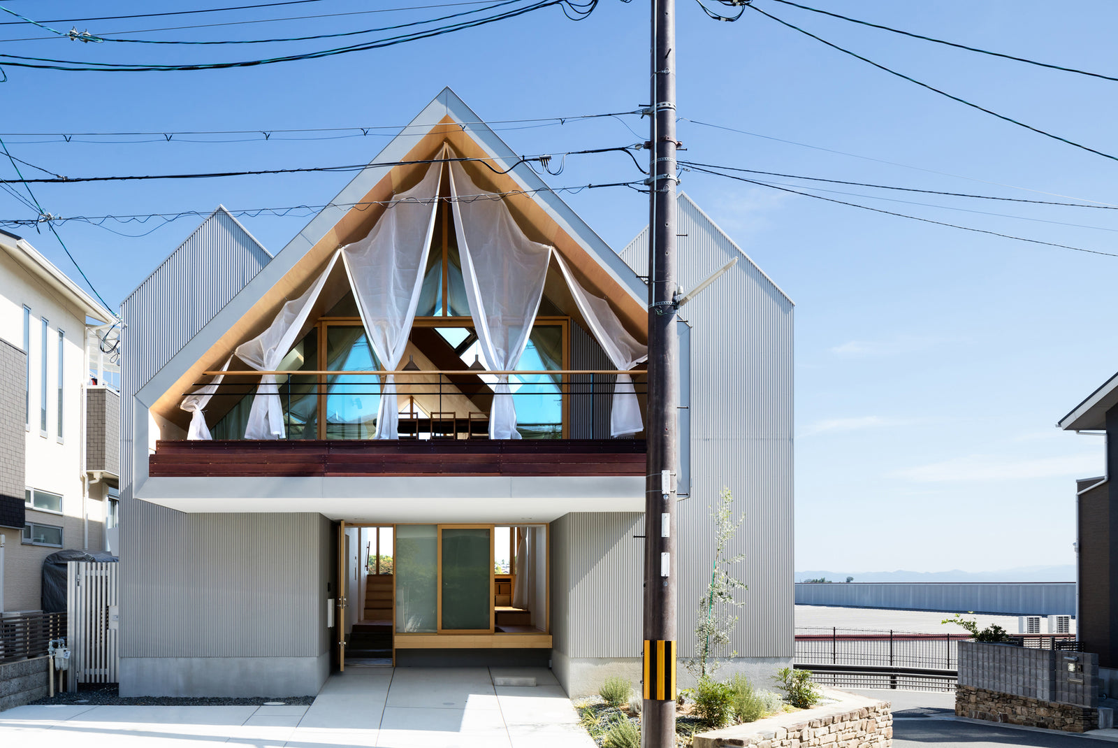 The Wood Clad Newtown Home Looks Out Over The Gorgeous Japanese Landscape