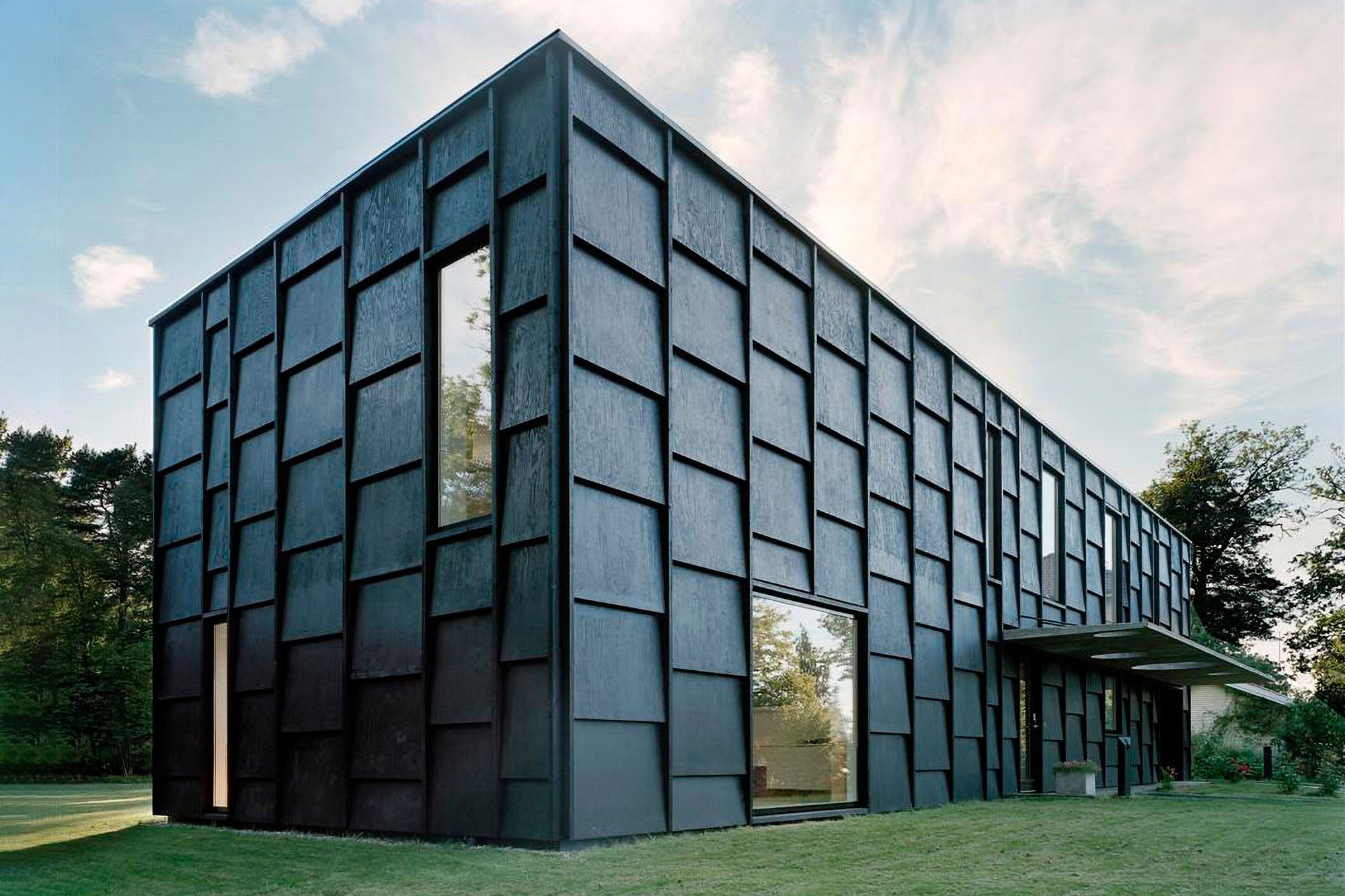 Stocksund Home A Slender Block With Light Cutouts And Multiple Heights